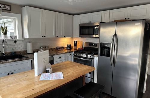 Liberty Cottage | Peaceful Lakeside Getaway with Hot Tub, Dock, Large Yard and Amazing Sunsets!