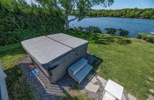 Liberty Cottage | Peaceful Lakeside Getaway with Hot Tub, Dock, Large Yard and Amazing Sunsets!