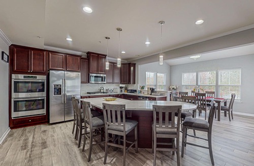 Waldorf House | Pleasant White Plains home with in-home gym, game tables, & jetted tub