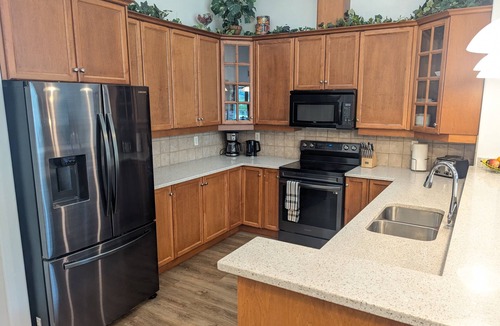 North End Condo | Pool Level Walkout condo- Balcony with the lagoon/Lake Views