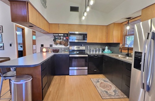 Comanche Point Cabin | Porches on Travis. An easy walk to Lake Travis, easy drive to Austin attractions