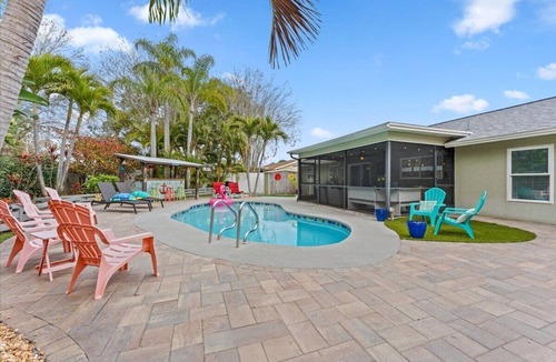 Palm Harbor House | Private Palm Harbor Home H/Pool, Hot Tub, Tiki Bar, Putting Green and More!