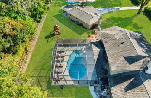 Westchase House | Private Pool Pickleball Game Room Sleeps 18
