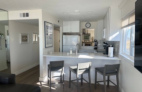 Imperial Beach Condo | Relax on the deck patio or beach and watch the dolphins frolicking in the waves