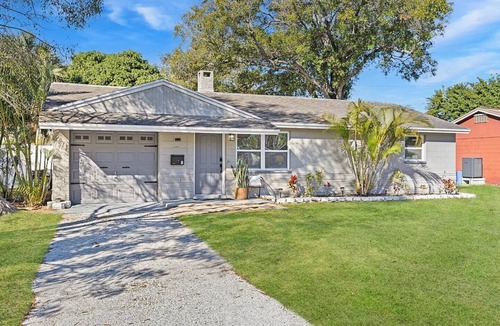 Pinellas Park House | Right at Home Stays - Modern 2BR 2BA w/Yard & Fireplace
