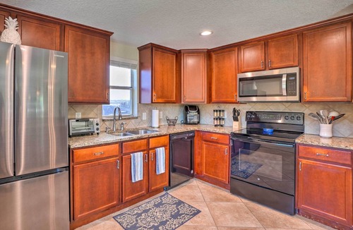 New Port Richey Cottage | Riverfront Home w/Putting Green & Boat Dock!