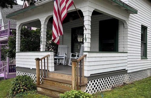 Bayside Cottage | Rustic cottage a block from the water at 19 Broadway, Bayside, Northport