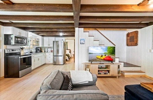 Canaan House | Salt water hot tub, king size beds, dog friendly, lake front, dock, boat launch