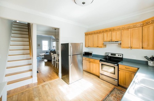 Beach Institute House | Serene, Charming Pet Friendly Historic District Townhome by Lucky Savannah