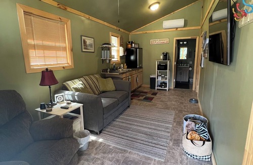 Matewan Cabin | SMUGGLERS RUN: Cozy Cabin, quick & easy access to Hatfield-McCoy trail heads.