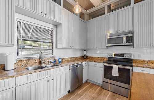 Temple Crest House | Sprawling river view estate with game room dock kayaks grill and fishing gear