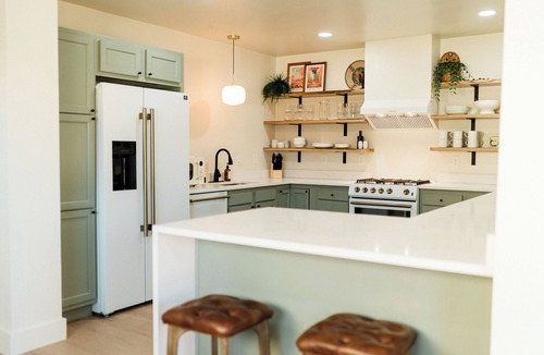 South Broadway House | Stay in this spacious, historic home and soak in the hot tub!