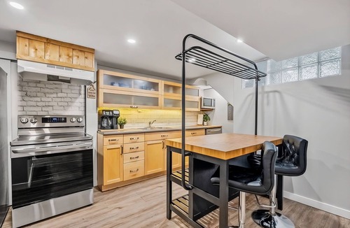 Northwest Calgary House | The Nest Private Suite w/Workspace Near UCalgary & Hospitals
