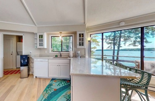 Isle of Springs Cabin | Unique oceanfront home with a deck, tons of natural light, & amazing views