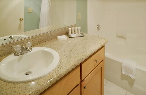 San Diego Country Estates Hotel | Vacation is Calling! Four Classy Units, Pool, Tennis Court, Onsite Game Room