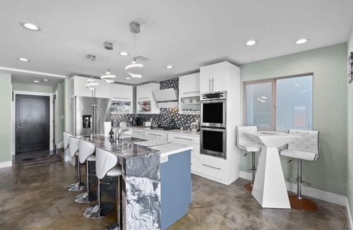 Sunset Beach House | Waterfront Luxury w/Hot Tub & Free Duffy Boat