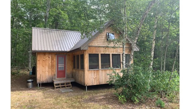 An off-grid comfy cabin in a quiet corner of a midcoast organic farm