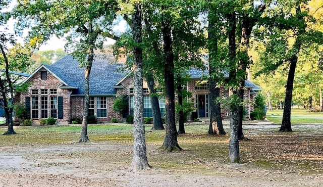 Beautiful Custom 4 bed with pool home with 3 acres. Private spacious backyard.