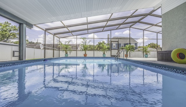 Beautiful, spacious, 4 king-beds home with heated and covered pool