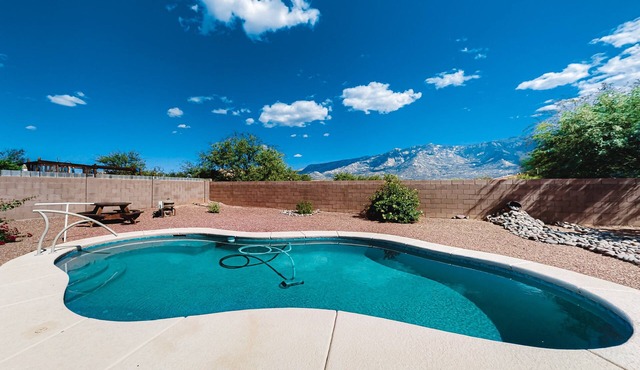 Captivating desert home with private pool, game room, grill, backyard & W/D