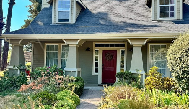 Charming craftsman home on 1.1 acres close to town and beautiful beaches