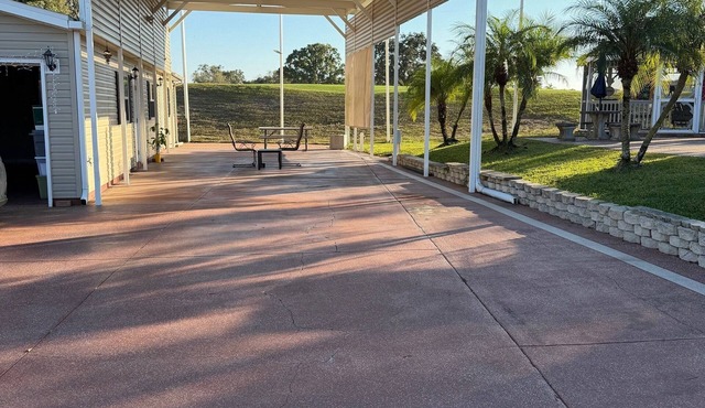 Class A RV pad in very active senior community with golf, pools, tennis, hottubs