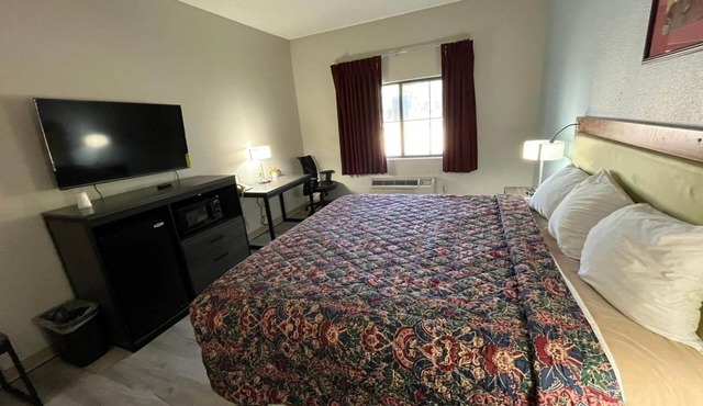 Coratel Inn & Suites by Jasper Wesley-Standard 1 King Bed Non-Smoking