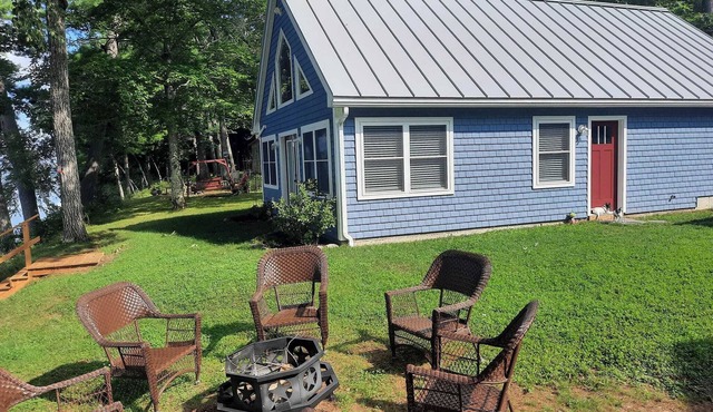 Enjoy amazing sunsets while steps from North Pond in this cozy 3-bedroom camp.