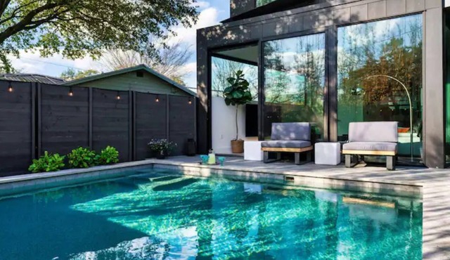 Heated Pool Oasis, Luxe Amenities, Prime Location, Chefs Kitchen, Skyline Views