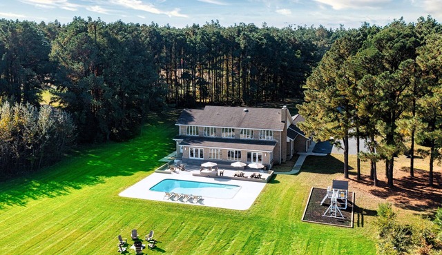 Heated pool, sandy beach, pier, and playground set punch point apart!