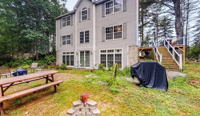 Idyllic waterfront home with furnished deck, grill, sweeping views & private W/D