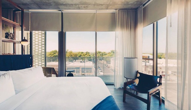 King Suite with Soaking Tub & Balcony in Austin