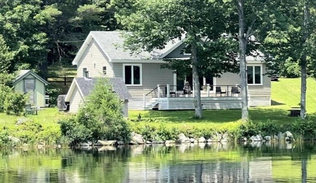 Lakefront Cottage with sauna and private dock.