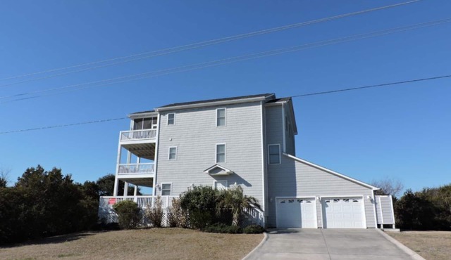 Large oceanside home w/elevator located at the Point in Emerald Isle!