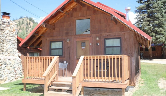 Located on the river, facing the Mountains
