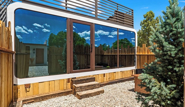LUXX Space Cabin Tiny House with rooftop deck, private fenced patio.