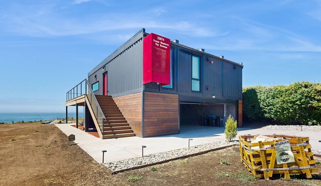 Modern oceanfront container home with electric fireplace & wifi - walk to beach
