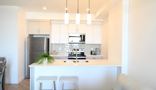 New condo w/fantastic view at west 17 Ave