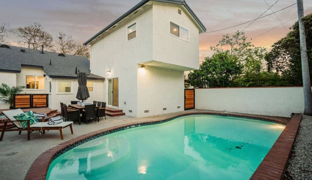 *New* modern pool home + 5 mi to beach + sleeps 14