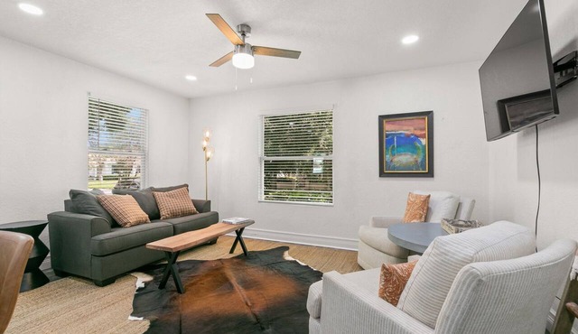 NEW! SoHo Sanctuary - Gorgeous Apartment Steps to S Howard Ave with Fenced Yard
