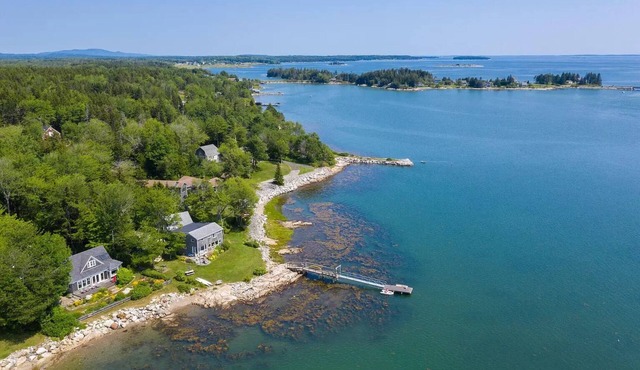 Ocean front, arts and crafts style family compound includes all amenities.