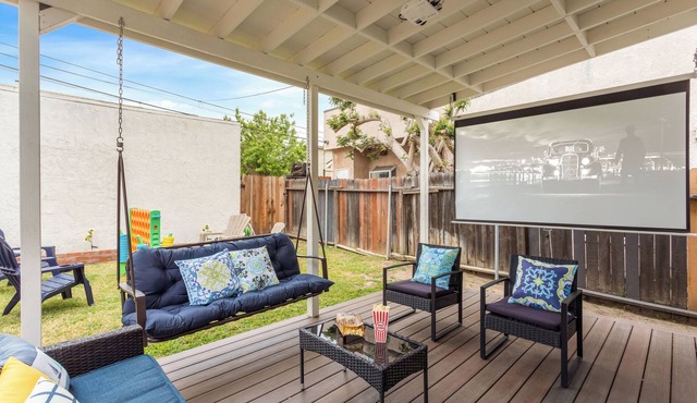 Seaside Serenity: Beach House with Outdoor Cinema