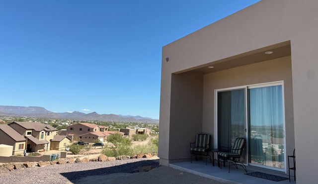 Serene, modern & fully furnished 1 bedroom apartment with desert mountain views