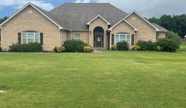 Spacious house perfect for entertaining with pool located on local golf course.
