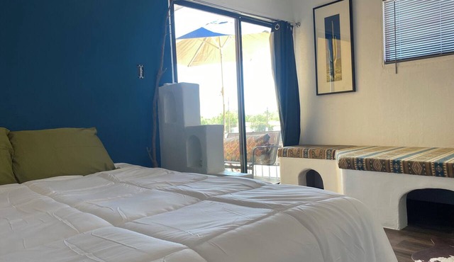 The Banco Room, a handcrafted Southwest retreat with Adobe bancos & Kiva frplc