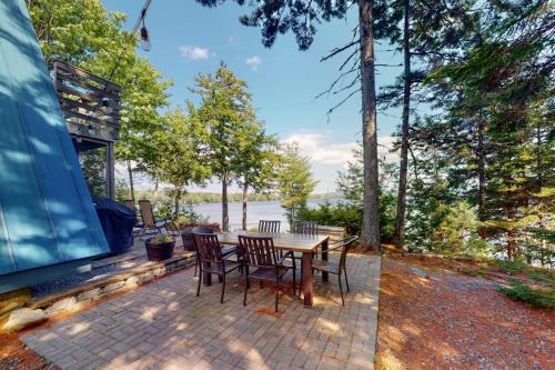 Waterfront A-frame on George's Pond with views, private dock, beach, kayaks, SUP