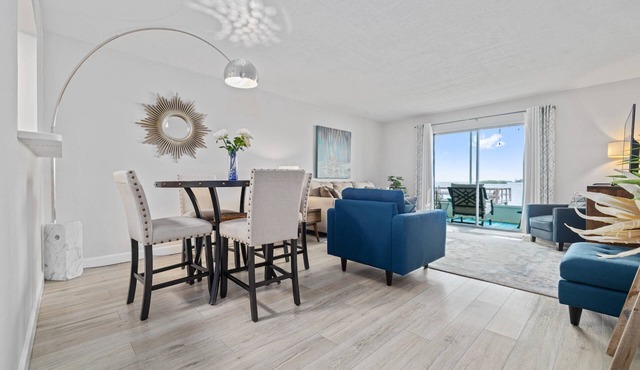 Waterfront Condo w/Heated Pool, Pier & Sunset Views – Walk to Dunedin Causeway & Honeymoon Island!