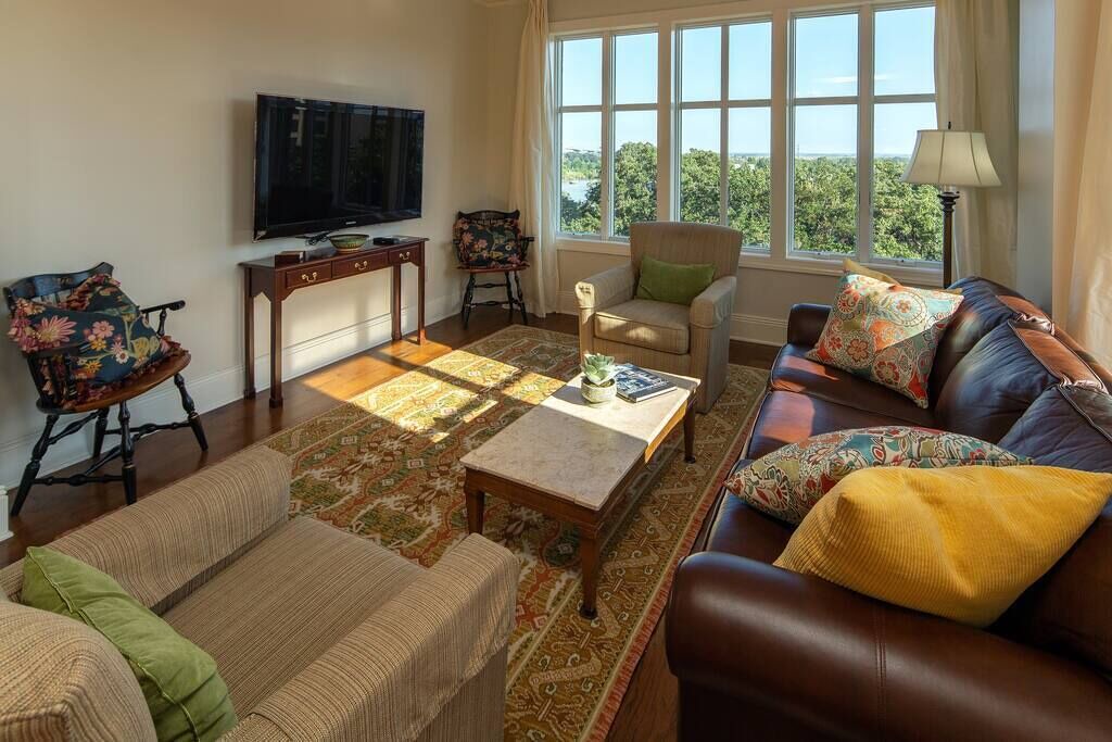Historic District - North Condo | Step into a spacious, luxury condo that has it all – a premiere location in the heart of the Historic District and floor-to-ceiling window views of the Savannah River, Talmadge Bridge and City Hall. 5th floor.Best river views in the building.
