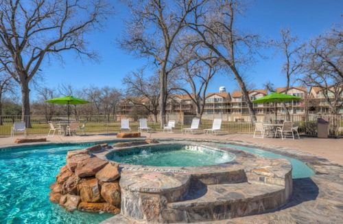 New Braunfels Condo | Waterwheel on the Guadalupe - river access, 2 pools, 4 hot tubs, 5 acres of lawn